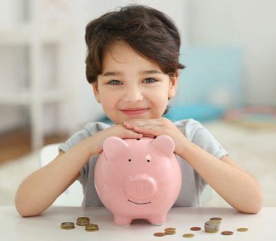 Teaching kids about money: Saving the world with your allowance